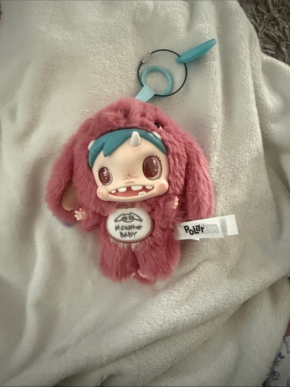 POL Pink Plush Monster Baby Keychain with Teal Hair Accent